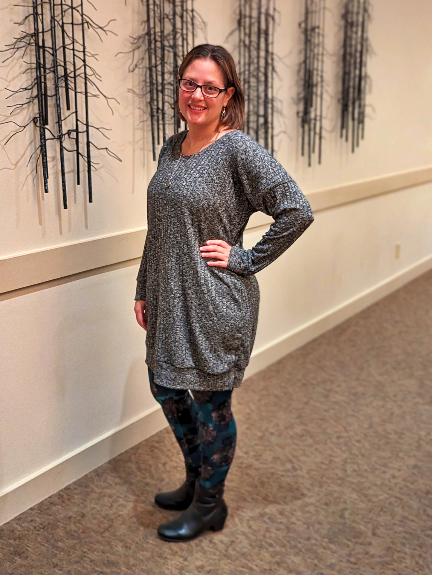 image of person wearing gray sweater dress
