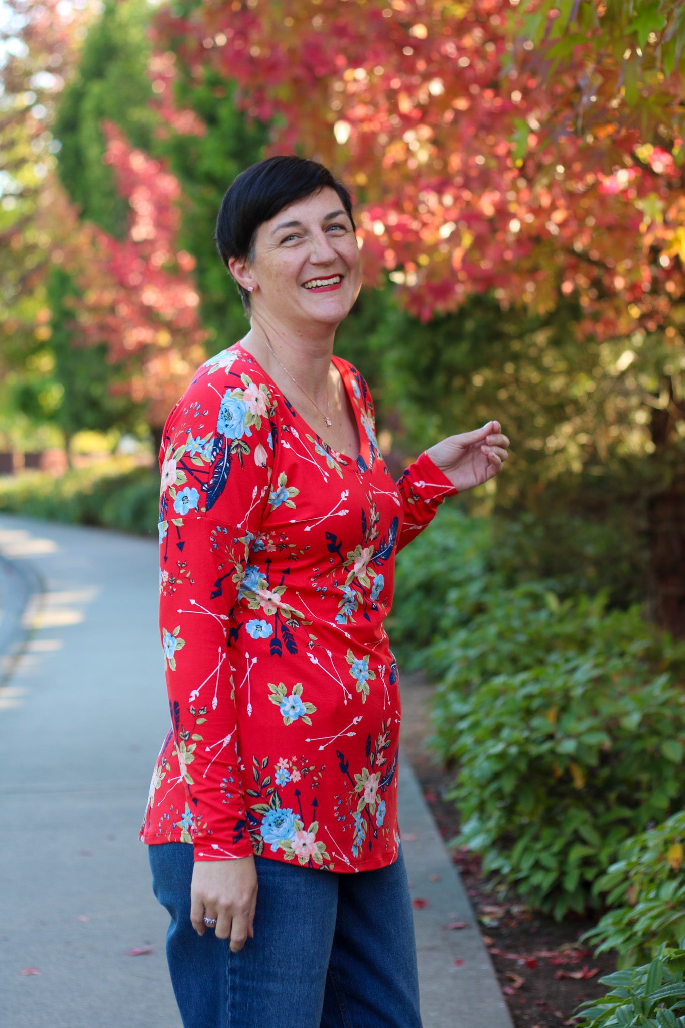 Image of red Rivet Patterns Daisy Dolman long sleeve tunic