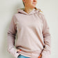 Image of pink Rivet Patterns Alpine Sweatshirt with hood, cuffs, and hem band.
