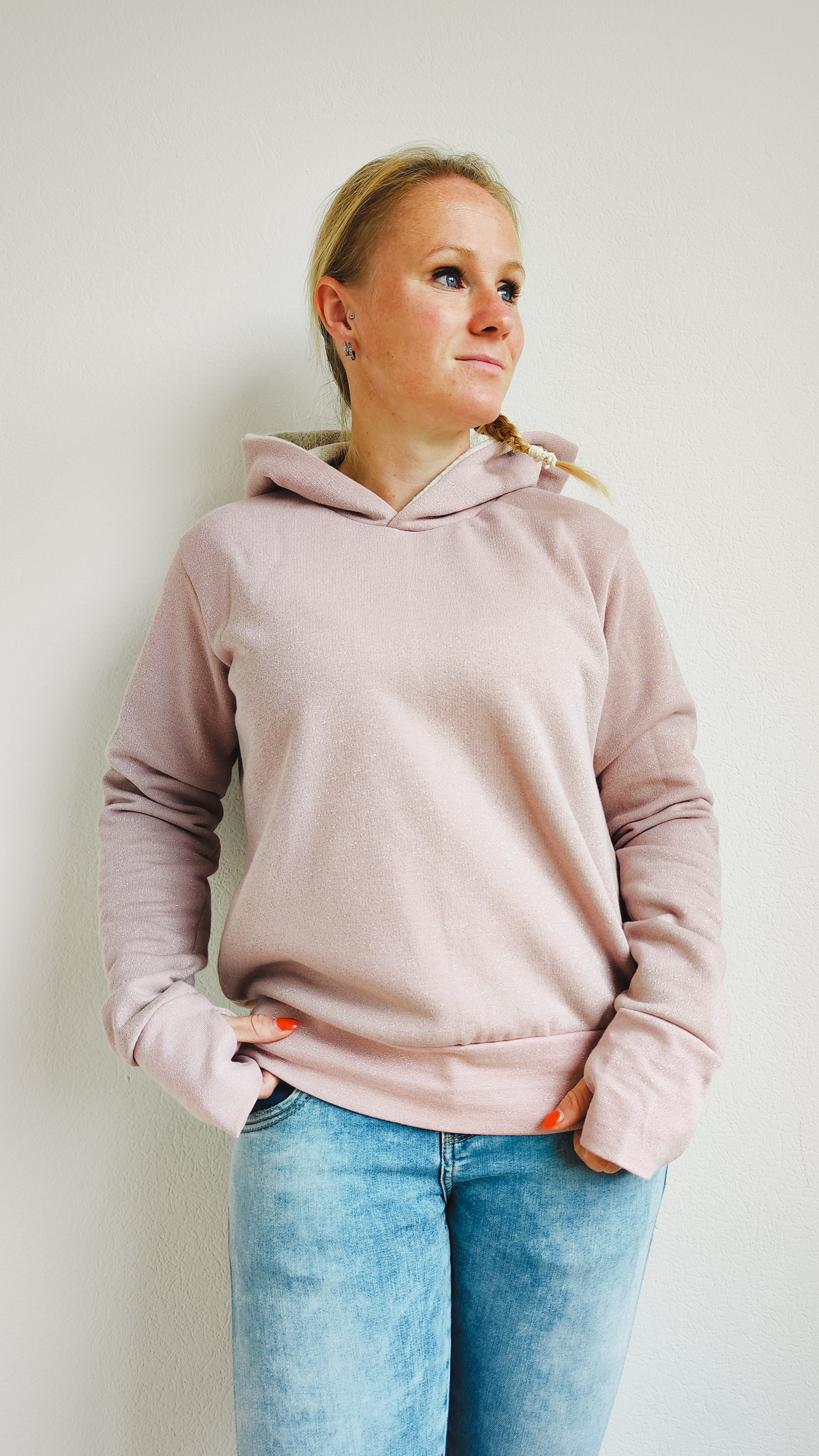 Image of pink Rivet Patterns Alpine Sweatshirt with hood, cuffs, and hem band.