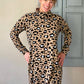 image of person wearing leopard turtleneck sweater dress