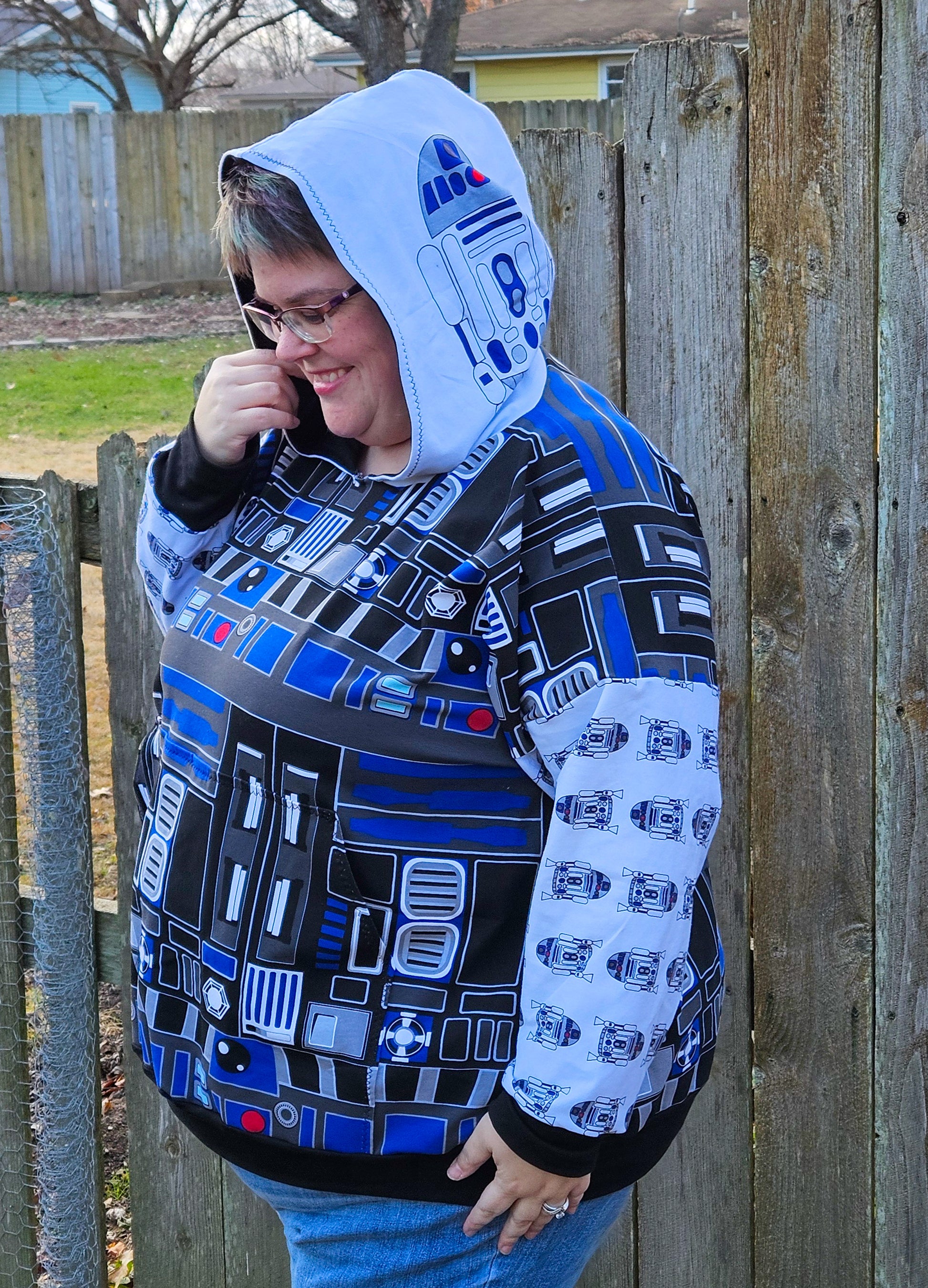 image of person wearing R2D2 star wars hoodie
