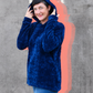 Image of woman wearing blue hood sweater