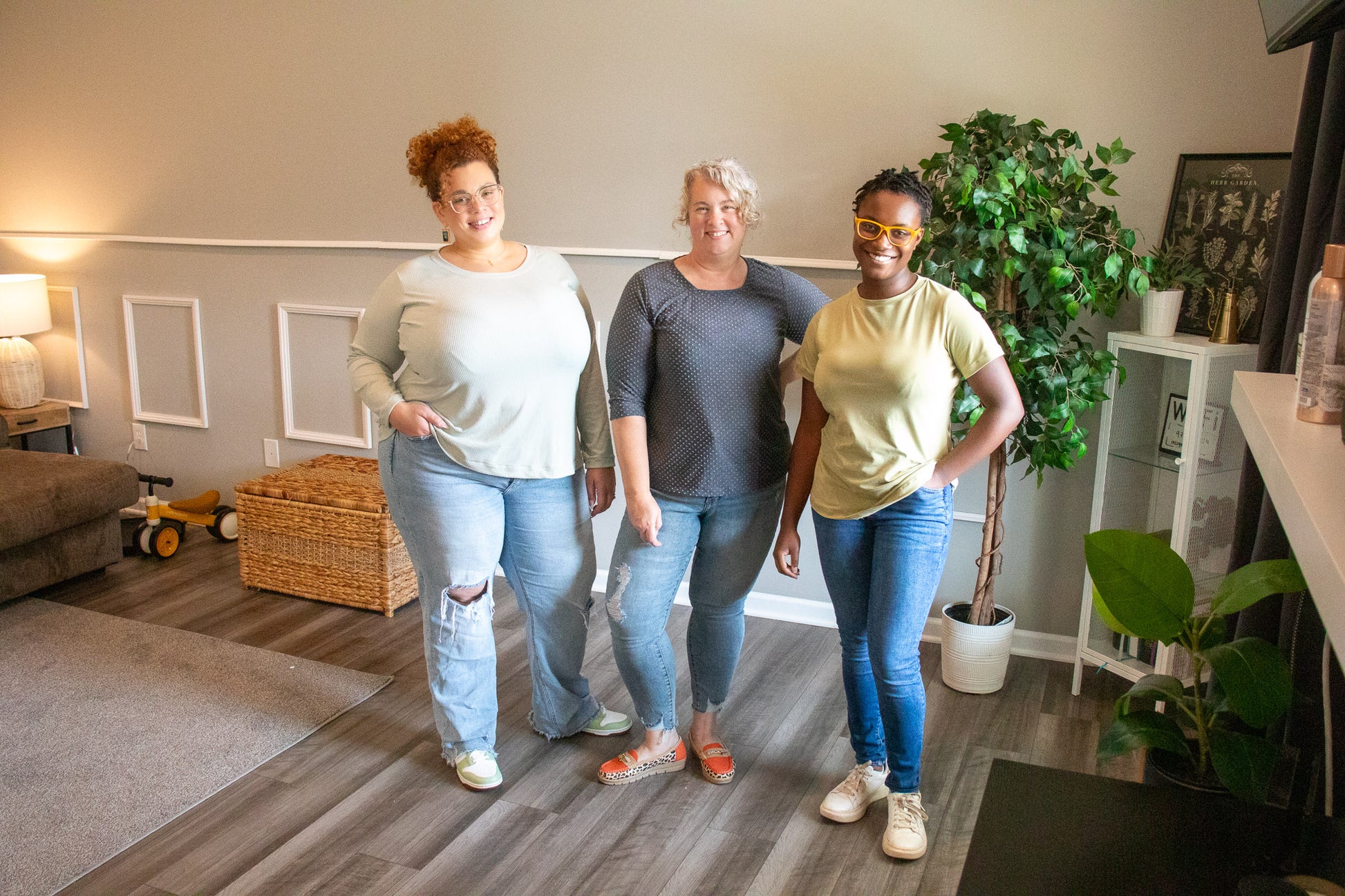 Image of three people wearing Rivet Patterns Heather Tee white long sleeve, yellow short sleeve, gray 3/4 sleeve