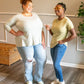 Image of two people wearing Rivet Patterns Heather Tee white long sleeve, yellow short sleeve