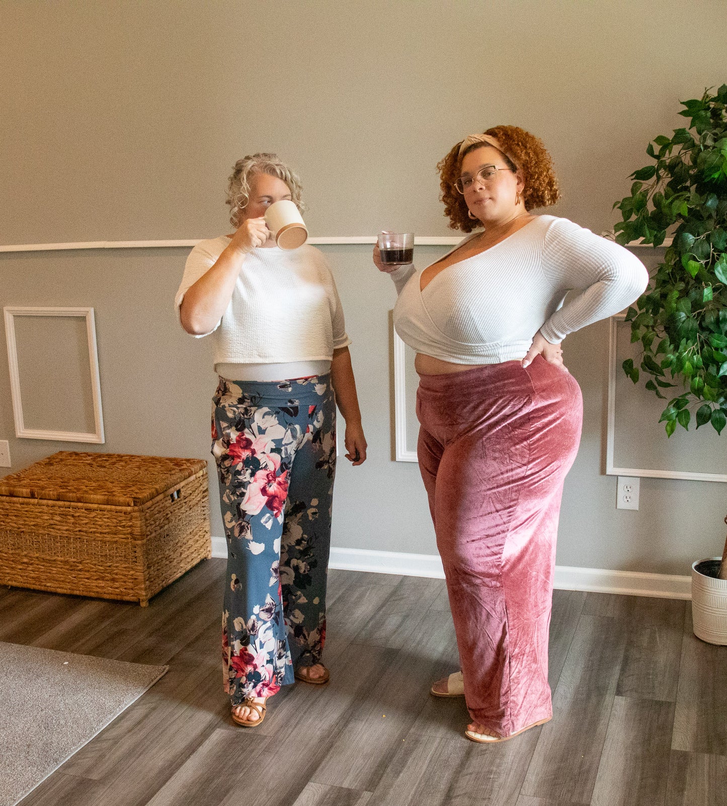 Image of two people wearing Rivet Patterns Pothos Lounge Pants blue floral and pink velvet